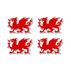 May include: Four red dragon stickers, each depicting the Welsh dragon. The dragons are in profile, with outstretched wings and a tail that curves into an arrow. The stickers are set against a white background.