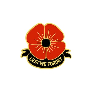 May include: A red poppy flower with a black centre and a gold ribbon with the text "Lest We Forget".