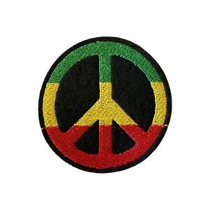 May include: A round peace sign patch with a black background and red, yellow, and green borders. The peace sign is embroidered in yellow.