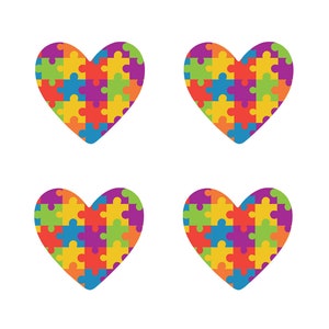 May include: Four colourful puzzle piece hearts, each made up of different coloured puzzle pieces. The hearts are arranged in a square pattern.