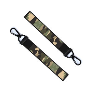 May include: Two black and green camouflage patterned keychains with black metal clips.
