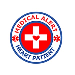 May include: A blue and white round sticker with the text "MEDICAL ALERT HEART PATIENT" and a red cross with a heart in the center.
