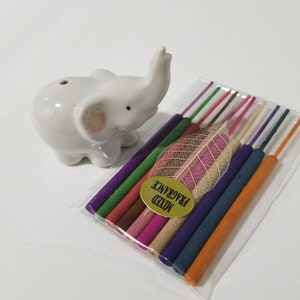 Keramische olifant + een pakje wierook.