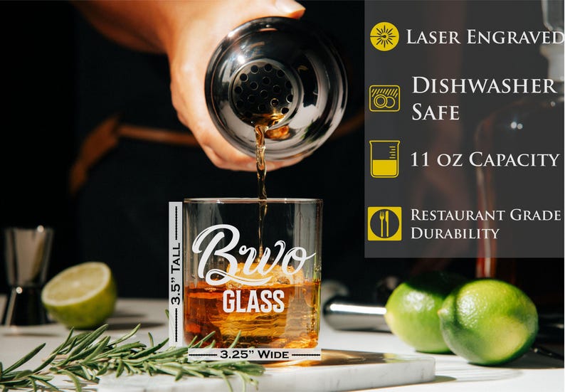 a person pouring a drink into a glass