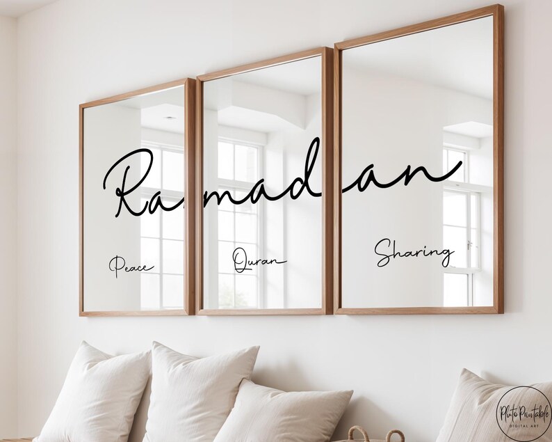 May include: Three framed mirrors with wooden frames are displayed on a white wall. Each mirror has the word "Ramadan" written in a cursive font, with the words "Peace", "Quran", and "Sharing" below.