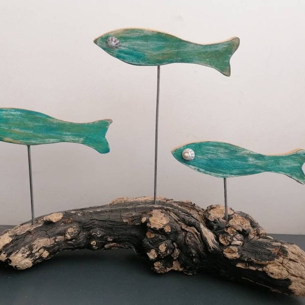 Trio de poissons sur bois flotté