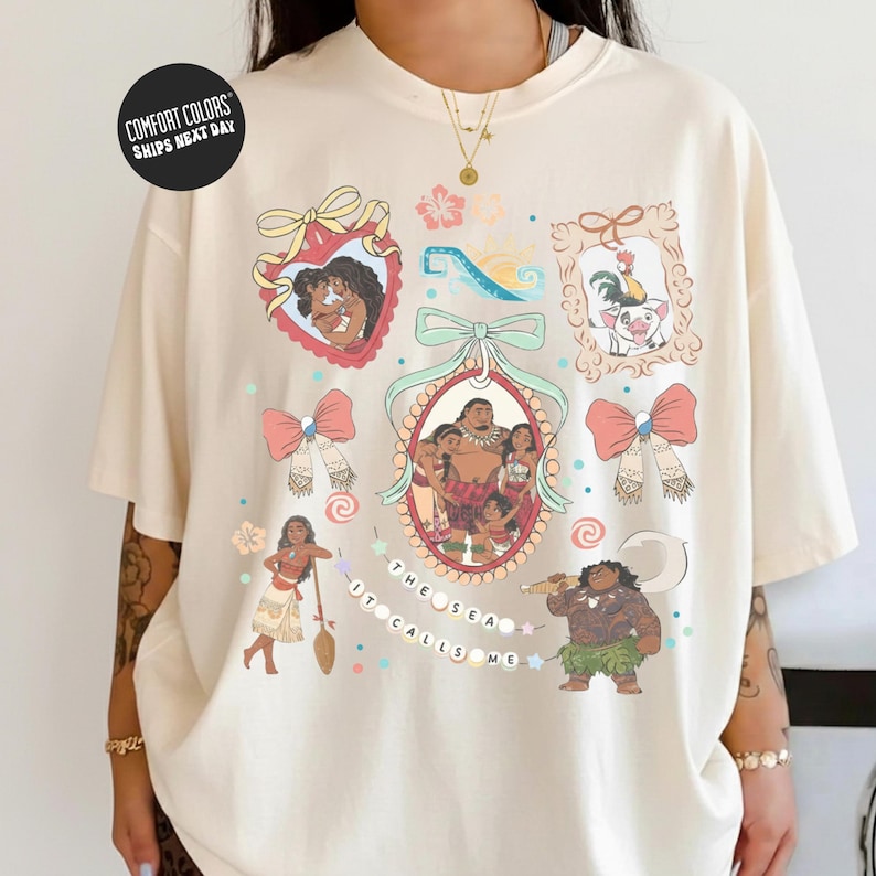 a person wearing a white t-shirt with various colorful illustrations and text.