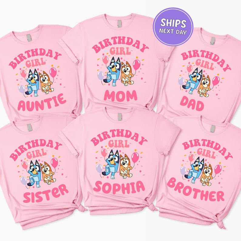 A collection of pink t-shirts with the text "BIRTHDAY GIRL" printed on them, along with illustrations of cartoon dogs.