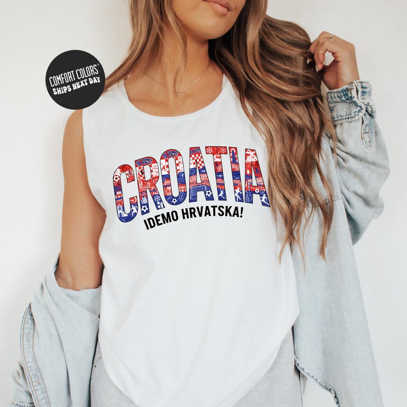 A woman wearing a white tank top with the word "Croatia" printed on it, along with the text "IDEMO HRVATSKA!" printed below.