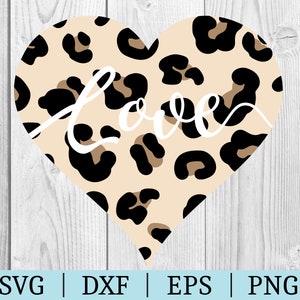 May include: A heart-shaped design with a leopard print pattern in shades of brown, black, and beige. The word "Love" is written in white cursive script over the pattern.