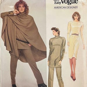 May include: A Very Easy Vogue pattern for Anne Klein designs. The cover shows fashion illustrations of women's clothing, including a cape, trouser suit, and dress. The text includes "American Designer" and the brand name "ANNE KLEIN".