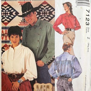 May include: A McCall's sewing pattern envelope 7123 for shirts, featuring illustrations of a person in a green button-front shirt with a black hat, a person in a white long-sleeve shirt, and two figures in red and blue shirts with jeans.