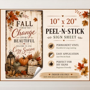 May include: A 10 inch by 20 inch peel-and-stick sign sheet featuring a rustic fall design with pumpkins, a lantern, and autumn leaves. The text reads: FALL IS PROOF THAT CHANGE CAN BE BEAUTIFUL WELCOME TO OUR COZY SEASON. Includes application details.