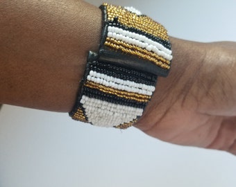 Wrist African bead and leather fashionable  bracelets.