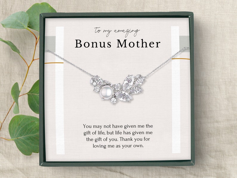This pearl necklace 18 inch chain with an adjustable loop and jewelry box is a perfect Second Mom Gift. The elegant pearl complements any outfit, a perfect way to show your appreciation. It adds a touch of elegance she will love.