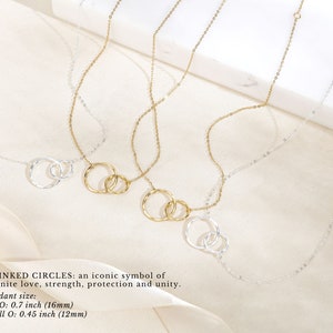 This 14k gold and sterling silver necklace which is 18 inches long features two linked circles, symbolizing the enduring bond you will share as a family. It is the perfect gift from the bride to express her gratitude for the man she raised.