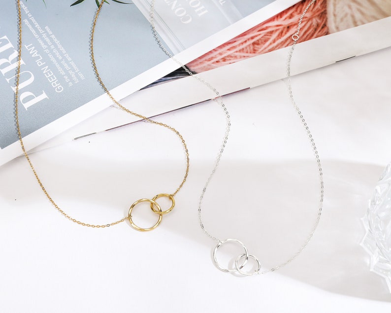 Strengthen the bond with a sister-in-law by gifting this timeless Unbiological Sisters Necklace. Crafted from 14k gold and sterling silver, this high-quality piece reflects love and trust, a treasured gift she will cherish for years.