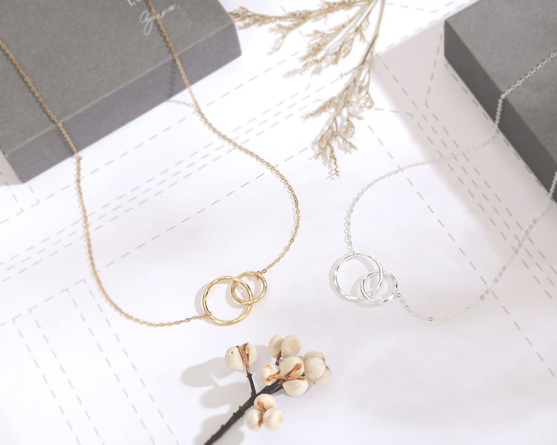 Show your appreciation to your best friend with our elegant friendship necklace, crafted with 14K gold and sterling silver. Each pendant is textured by hand, creating a uniquely beautiful hammered finish that sparkles with each movement.