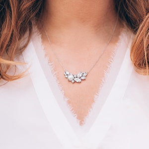 This stunning sterling silver necklace combines a luminous pearl with sparkling cubic zirconia. The 18 inch length creates a beautiful drape, perfect for any outfit. It is a heartfelt gift to show your appreciation for your incredible Mother Figure.