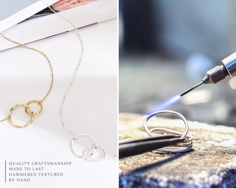 Gift your long-distance friend with our Unbiological Sisters Necklace. Crafted in 14k gold and sterling silver, and featuring eternity circles, it symbolizes your unbreakable bond. The necklace is 18 inches long with an adjustable ring at 16 inches.