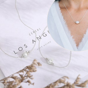 This delicate sterling silver pearl necklace is a perfect Bonus Mother Necklace Gift. The 18 inch chain with an adjustable loop at 16 inches allows for a personalized fit. The beauty of the pearl makes it a treasured gift that she can wear every day.