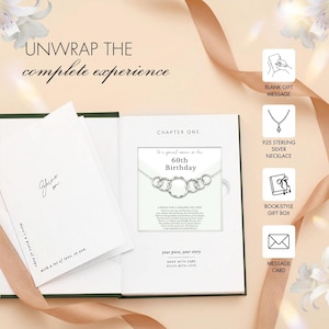 May include: A book-style gift box with a silver necklace, perfect for a 60th birthday. The necklace features six interlocking rings. The box includes a message card and a blank gift message option. Text on the box reads "Unwrap the complete experience."