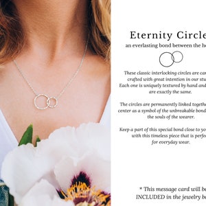 This 18 inches sterling silver necklace features two linked eternity circles, a symbol of infinite love and connection. Presented in our custom designed jewelry box with a blank greeting card, it is the perfect necklace gift to cherish.
