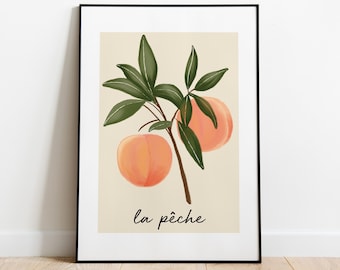 May include: A framed print with a peach tree branch with two peaches and green leaves. The text "la pêche" is written in black cursive at the bottom of the print.