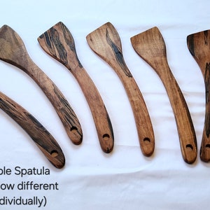 May include: Six wooden spatulas with different grain patterns. Ambrosia Maple Spatula (picture to show different grains, sold individually)