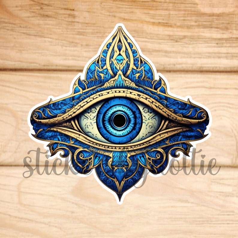 May include: A blue eye with gold and blue ornate detailing, resembling a mandala, in the shape of a triangle.