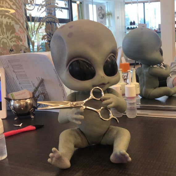 realistic alien doll