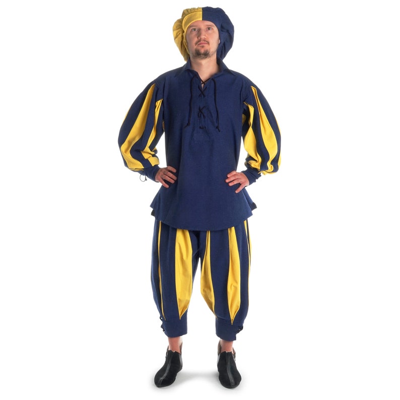 May include: A blue and yellow medieval costume with a matching hat. The costume features a blue tunic with yellow striped sleeves and yellow striped pants.