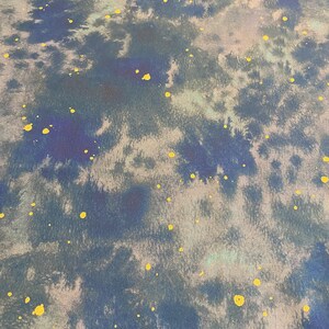 May include: Abstract pattern with a watercolor effect. The design features a blend of blue, gray, and teal hues, with scattered yellow paint splatters. The overall aesthetic is reminiscent of a starry night sky.