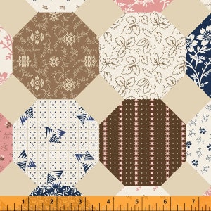 May include: A patchwork fabric with a variety of patterns in brown, white, pink, and blue. The fabric features octagonal shapes with different floral and geometric designs.