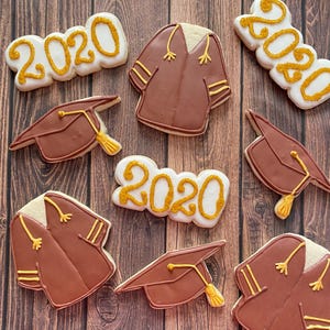 Coupe-biscuit de robe de graduation