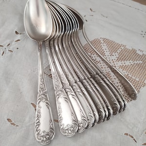 Set of 12 old silver-plated soup spoons