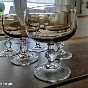Set of 5 vintage champagne glasses drinking in smoked glass and hexagonal transparent foot