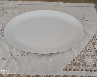 Plat ovale en porcelaine Royal Tettau Bavaria marli voluté et liseré doré