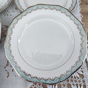 Set of 7 Longwy France earthenware dessert plates, Trianon model