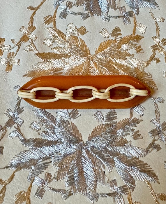 Vintage Bakelite Celluloid Chain Brooch