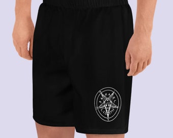 Puede incluir: Shorts deportivos negros con un pentagrama blanco y las palabras "Samael Lilith" dentro de la estrella.