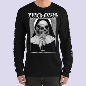 May include: Black long-sleeve t-shirt with a graphic of a nun with a skull face, praying with a rosary. The text "BLACK+MASS" is printed above the graphic.