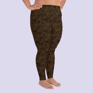 May include: Brown leggings with a black and brown gear pattern.