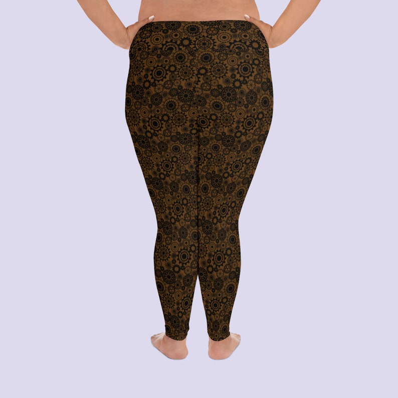 May include: Brown leggings with a black and brown gear pattern.
