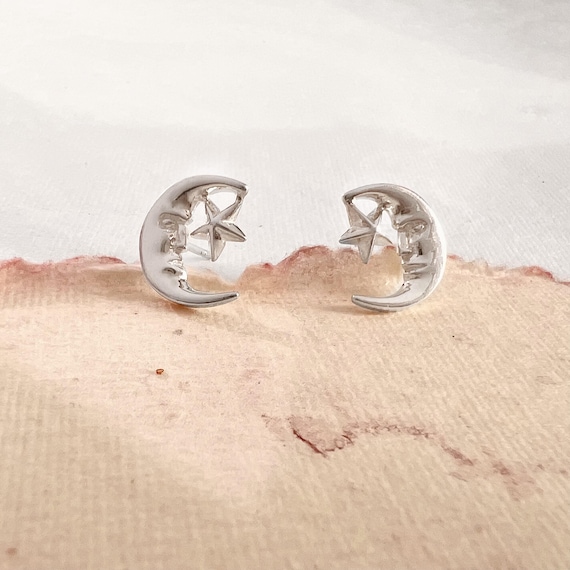 Orecchini a forma di stella in oro e diamanti ct 0.21 G