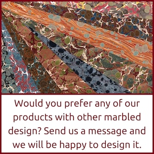 May include: A collection of marbled paper samples in various colors and patterns, including red, orange, brown, green, blue, and black. The paper is arranged in a fan shape, with the edges of each sheet overlapping. The text below the paper reads: "Would you prefer any of our products with other marbled design? Send us a message and we will be happy to design it."