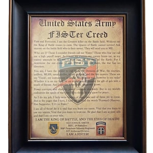 May include: Framed print of the United States Army Fister Creed. The text is in a vintage style with a black frame. Includes the Airborne insignia and the text "I AM THE KING OF BATTLE, AND THE EYES OF DEATH!"