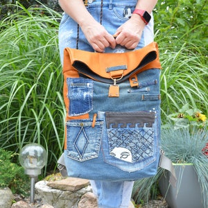 Handgemachter Rucksack aus recyceltem Leder und Denim-Schultertasche