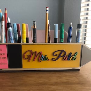 Pencil and pen organizer