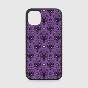 May include: A purple phone case with a black and white pattern of ghosts and a haunted mansion design.
